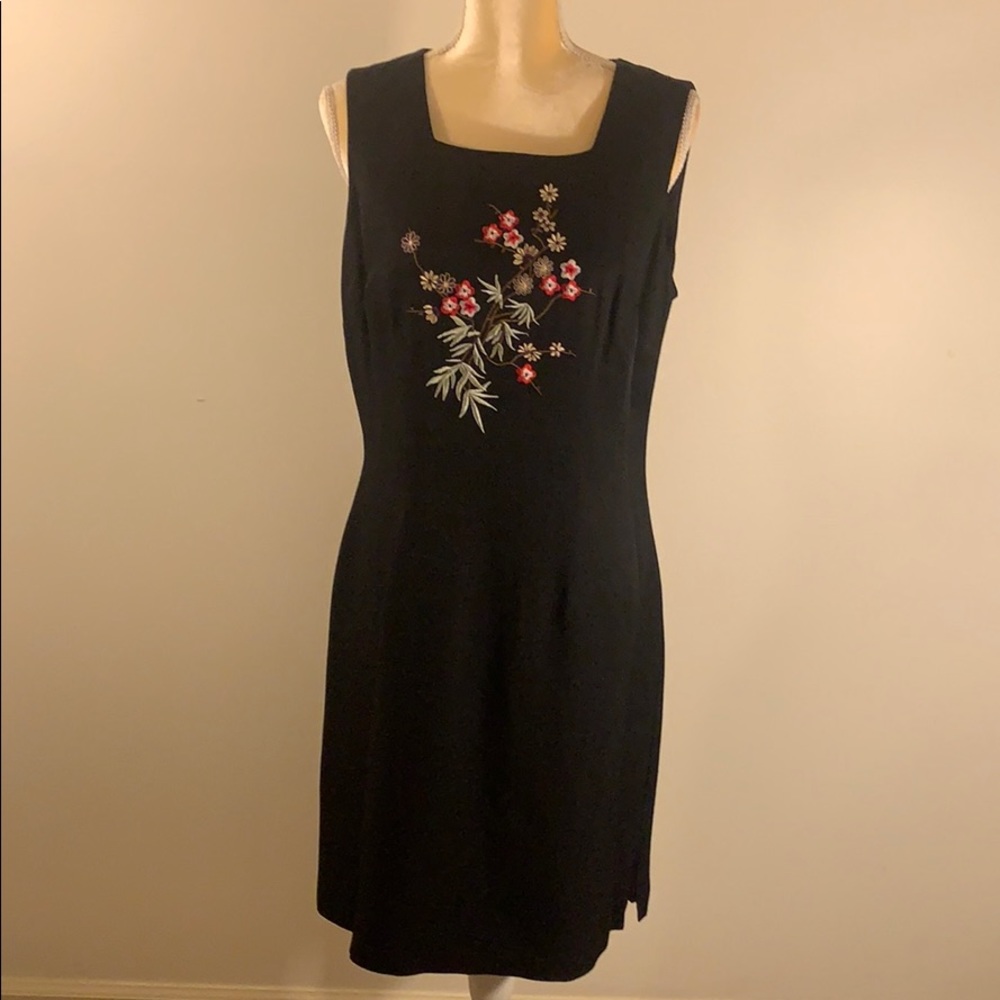 Black dress with flowered embroidery